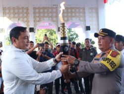 Kapolres Aceh Besar Sambut Kedatangan Kirab Api PON XXI Aceh-Sumut 2024